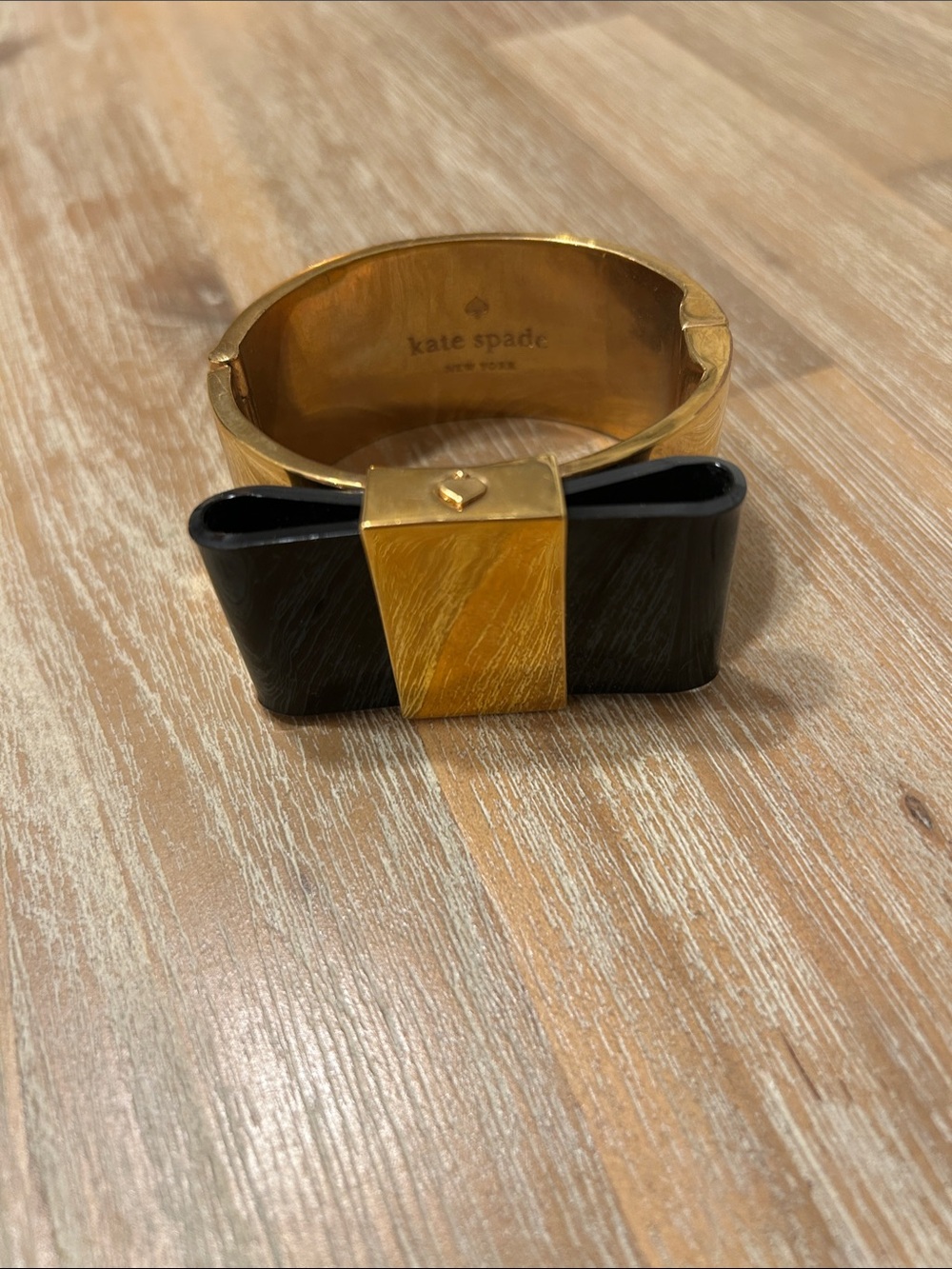kate spade Gold-Tone Bangle with Black Bow Accent
